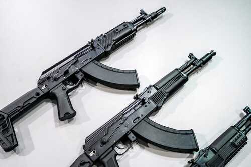 Modern,Weapons,Automatic,Rifles,And,Machine,Gun,On,The,Counter.