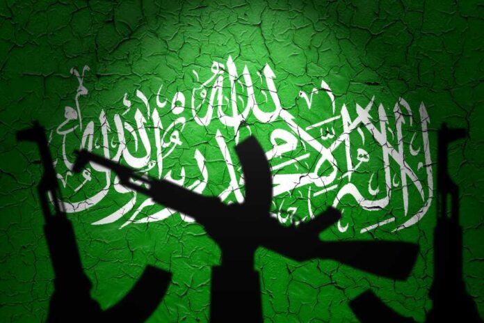 Flag,Of,Hamas,Painted,On,The,Cracked,Wall.,Gaza,And