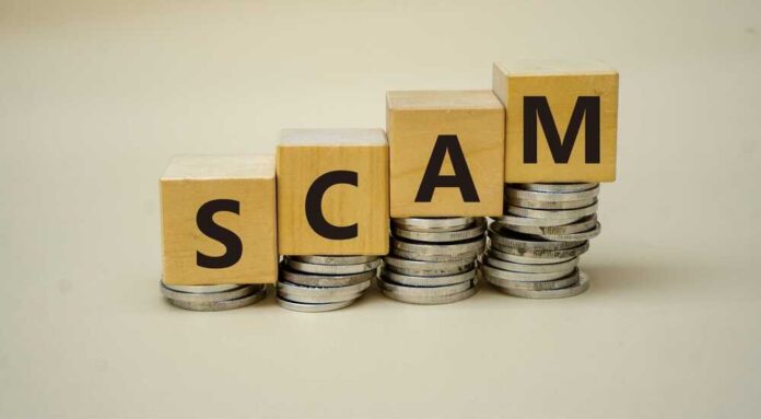 Scam,Symbol.,Copy,Space.,Concept,Word,Scam,On,Wooden,Blocks