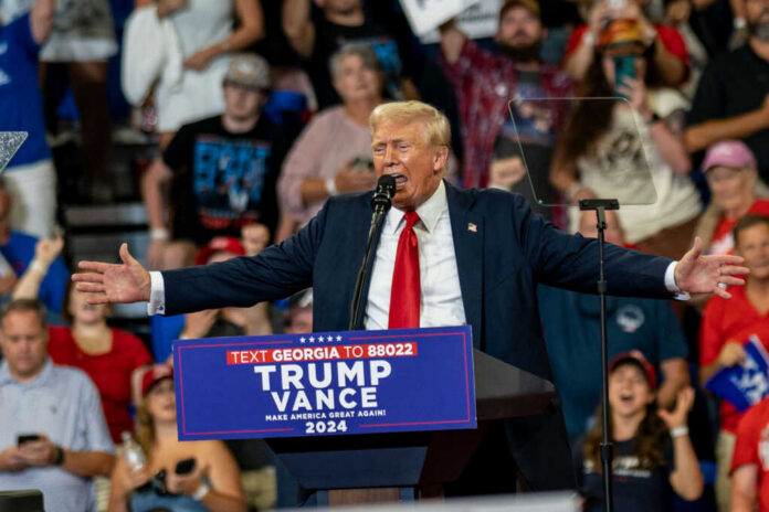 I dont know who this is speaking at a rally