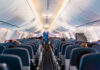 Airspace Chaos Grips Middle East Evacuations Interior view of airplane cabin with passengers