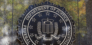 FBI seal on a concrete wall outdoors