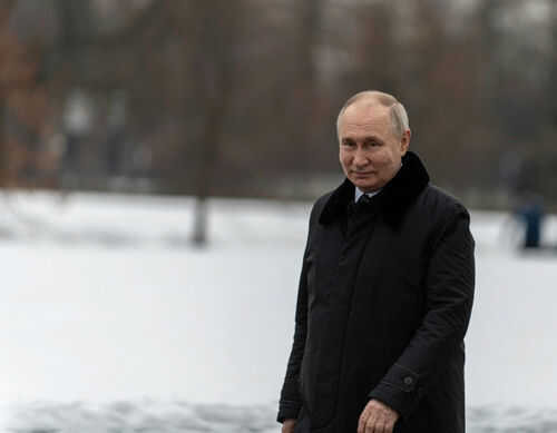 putin2418114439 Person in dark coat standing on snowcovered ground