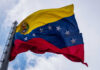 Baseball Victory Unites Venezuela Amid Crisis Venezuelan flag waving against a cloudy sky