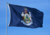 Flag of Maine featuring the state seal and blue background