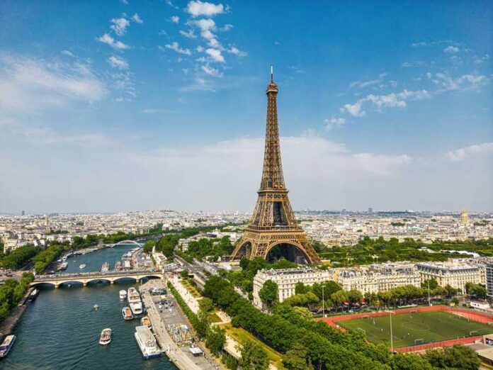 Aerial view of the Eiffel Tower in Paris with the Seine River and cityscape