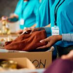Volunteers sorting donations in a community service setting