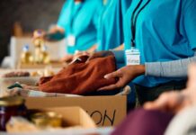 Volunteers sorting donations in a community service setting
