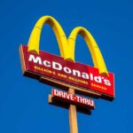 McDonald's restaurant sign with drive-thru indication