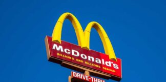 McDonald's restaurant sign with drive-thru indication
