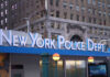 Signage of the New York Police Department in an urban setting