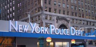 Signage of the New York Police Department in an urban setting