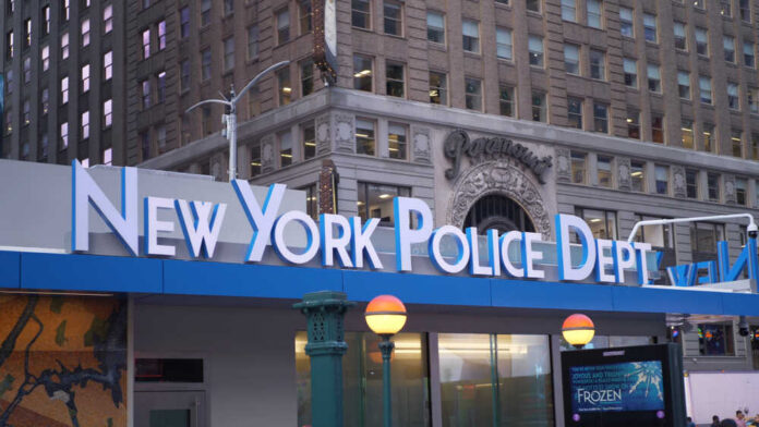 shutterstock_1283808103.jpg Signage of the New York Police Department in an urban setting