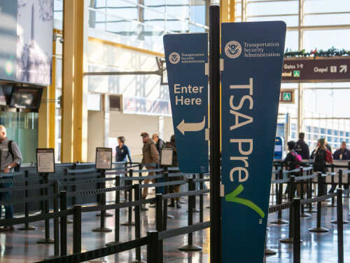 shutterstock_1549154468.jpg Signage indicating TSA PreCheck entrance at an airport