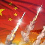 Missiles launching against a backdrop of the Chinese flag