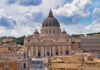 St. Peter's Basilica in Vatican City under a cloudy sky