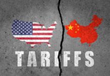 Graphic representation of the USA and China with the word 'TARIFFS' beneath