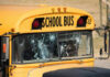 BMW vs. School Bus: What Really Happened? Damaged windshield on yellow school bus number 32