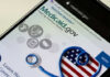 Fraud Ring Takedown: Shocking White House Move! Medicaid website displayed on a smartphone screen
