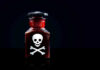Bottle with skull and crossbones warning symbol