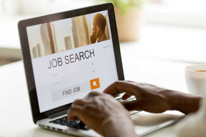 Person using a laptop for job searching