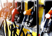 Cyber INVASION: U.S. Gas Stations at Risk! Close-up of multiple gas pumps at a fuel station