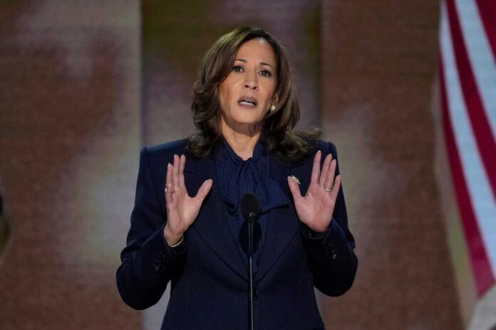 A female politician delivering a speech at a podium