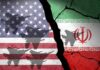 A cracked wall featuring the flags of the United States and Iran, with military aircraft silhouettes