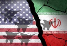 U.S. Hits Back! Iranian Attacks Test Limits! A cracked wall featuring the flags of the United States and Iran, with military aircraft silhouettes