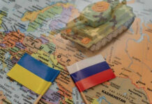 Moscow Rattled — Ukraine’s Biggest Drone Blitz Toy tank with Ukraine and Russia flags on map.