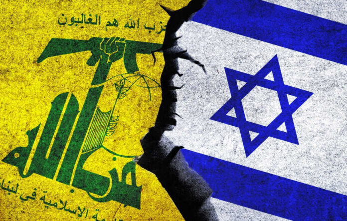 604871714 Hezbollah and Israeli flags split by a crack.