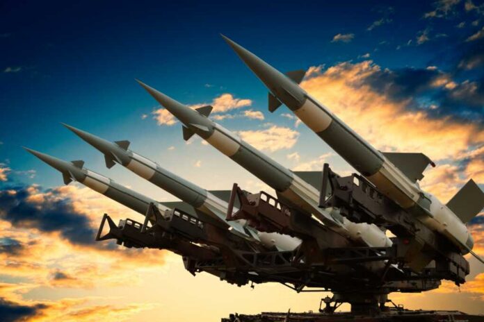 Radom,,Mazowieckie,,Poland,-,August,23th,,2015:,Anti-aircraft,Cruise,Missles Cruise missile launcher with missiles pointed upwards against a sunset sky