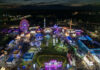State Fair Crowd Claims Spark New Debate Nighttime aerial view of a brightly lit carnival with rides and crowds