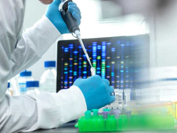dna-testing2025910556jpg Scientist with pipette in front of DNA sequences