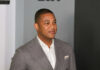 Ratings Over Truth? Lemon’s CNN Confession Man in a gray suit smiling at an event