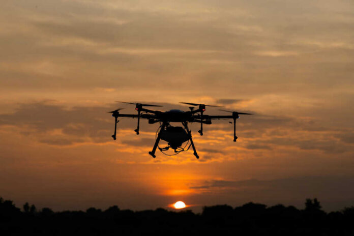 drone-flying-on-the-sky2480271581jpg A drone flying against a sunset background