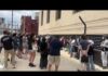FBI Raids Expose Alleged Activist Threat Network People protest at federal courthouse against FBI raid