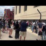 People protest at federal courthouse against FBI raid