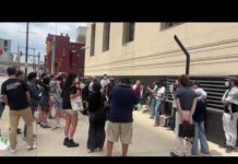 People protest at federal courthouse against FBI raid