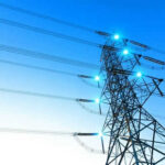 Electricity pylon with blue sky background