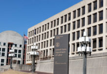 Inflation Spike Hits Families Where It Hurts Exterior view of the United States Department of Labor building with flags