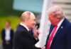 Two political leaders shaking hands during a meeting