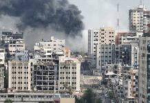 Modern Warfare Is Changing Before Our Eyes City buildings with heavy smoke and extensive war damage