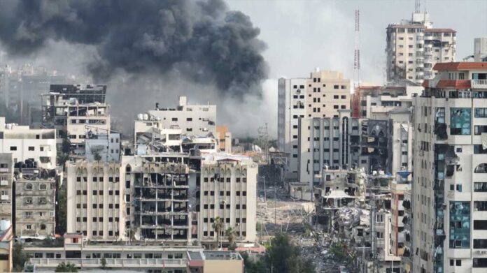 City buildings with heavy smoke and extensive war damage