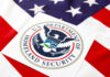Questions Grow Around DHS Contract Influence Department of Homeland Security seal on American flag
