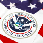 Department of Homeland Security seal on American flag