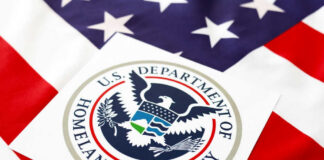 Department of Homeland Security seal on American flag