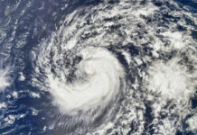 Tropical cyclone swirling over the ocean