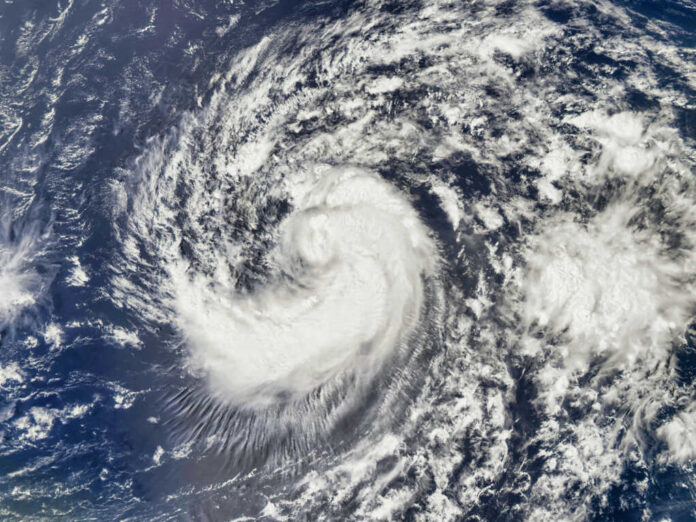 hurricane-helene2450664877jpg Tropical cyclone swirling over the ocean