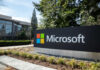 Microsoft’s Visa Numbers Spark Jobs Debate Microsoft campus sign outside modern office building